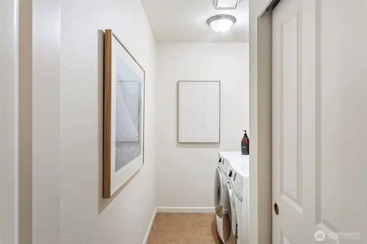 Laundry room with full sized, side by side washer and dryer, additional cabinets and closet! Laundry room with full sized, side by side washer and dryer, additional cabinets and closet!