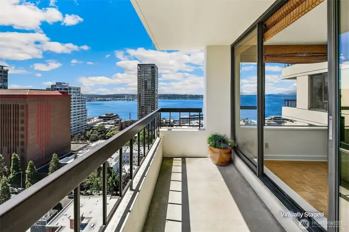 Spacious deck off the living room, the perfect spot to enjoy your favorite beverage.