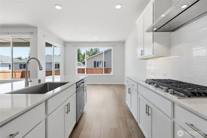 Light spacious kitchen with Kitchen Aid applinance. Light spacious kitchen with Kitchen Aid applinance.