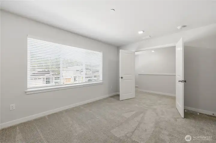 Large bonus room with french doors. Large bonus room with french doors.