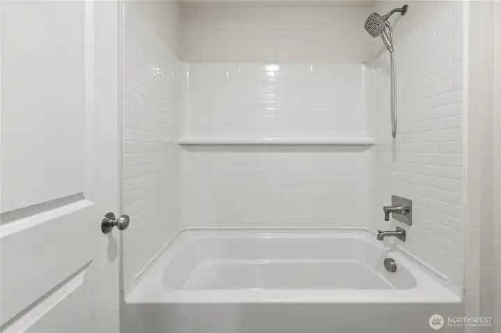 Deep tub and shower. Deep tub and shower.
