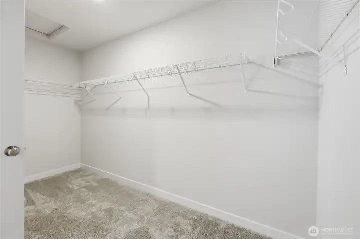 The large walk in closet. The large walk in closet.