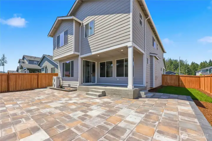 Fully enclosed fenced backyard with large stone patio and deck. Wonderful for gatherings! Fully enclosed fenced backyard with large stone patio and deck. Wonderful for gatherings!