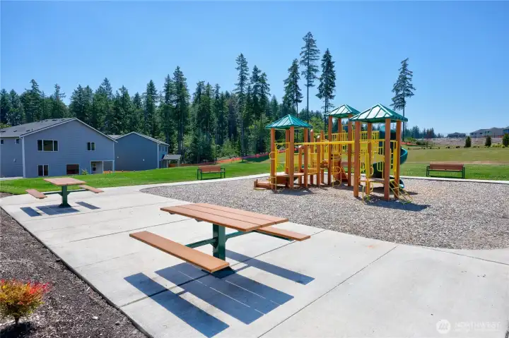 The kid's park with picnic area and benches. The kid's park with picnic area and benches.