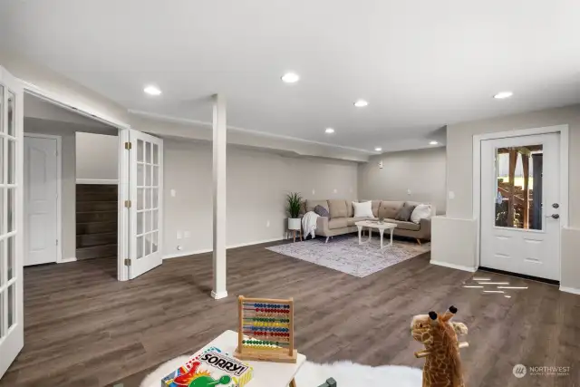 Expansive family room downstairs with endless possibilities.