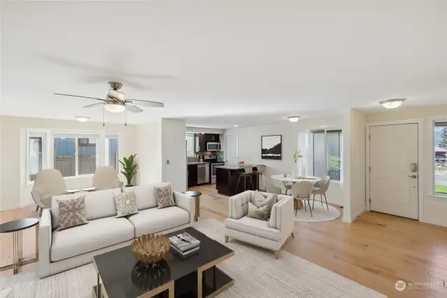 Second sitting area in bay window or use as more formal dining space.  Kitchen bar has room for two barstools and breakfast table