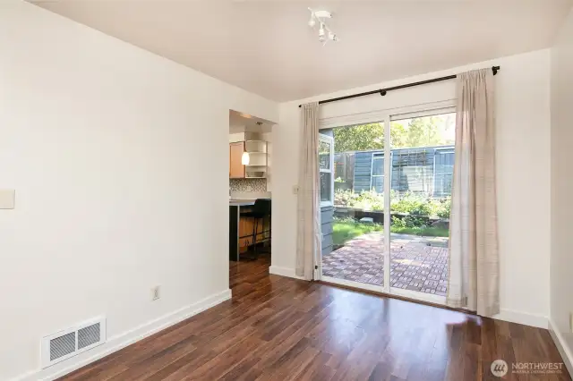 View from large dining area to outside.