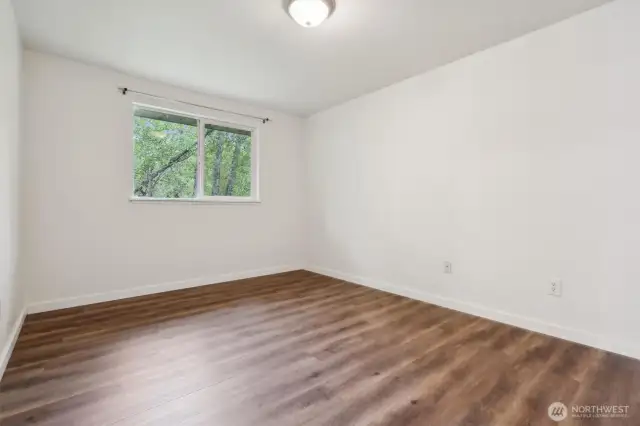 Primary bdrm looks to back yard