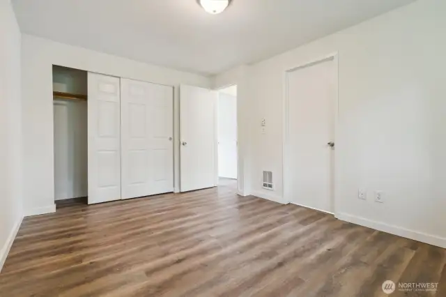 Another angle of primary shows door to full bath