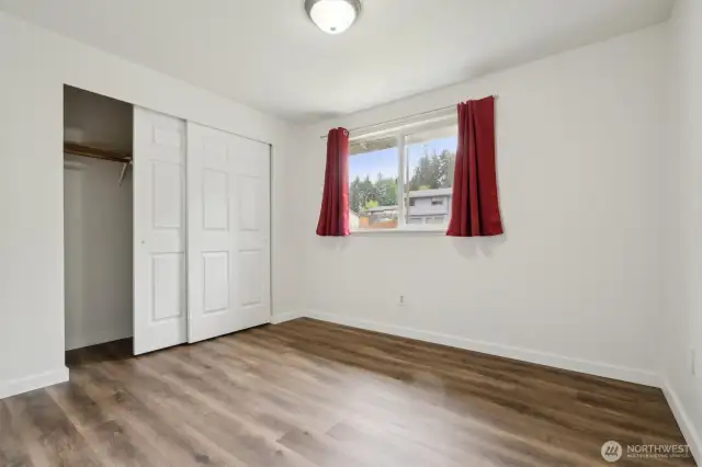 Upper level bdrm #2 looks to front yard
