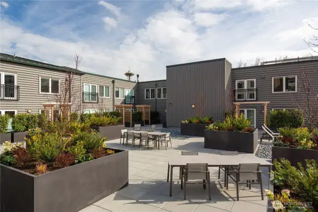 Outdoor deck is mere feet from your front door.