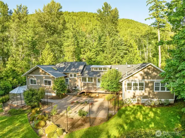 CHUCKANUT! Where cottage charm meets luxury living on a full acre with seasonal saltwater glimpses
