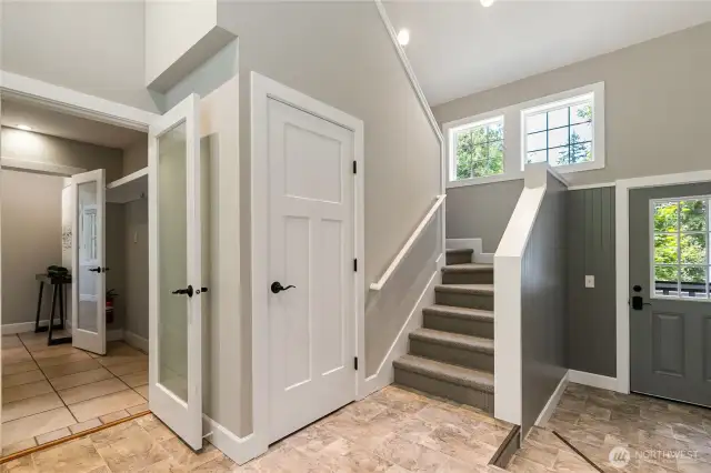 Stairway to the upper level fully finished room.