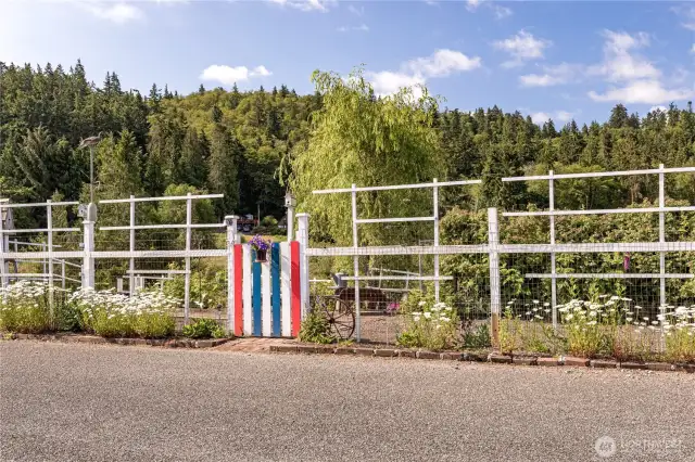 But wait, that is not all.  This property also has another small lot across the street that is on the lagoon and  currently has 2 apple trees, 1 peach and Marion berries along with more garden space