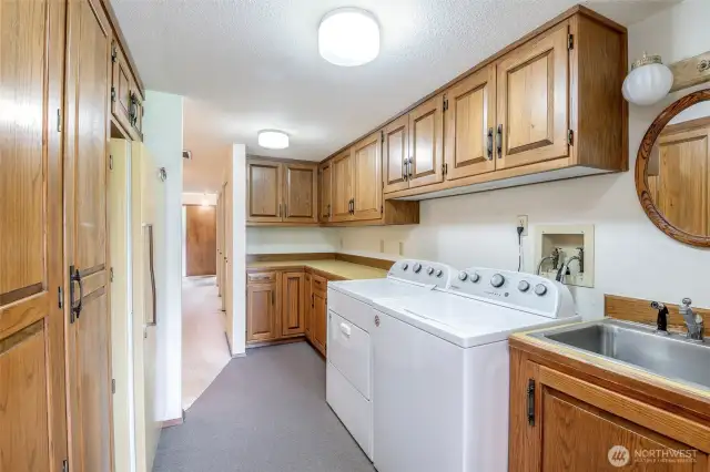 Laundry Area with built ins - extra freezer stays