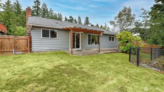 Easy to maintain yard ready for you to create your own little oasis back here!