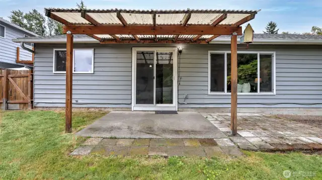 You will love having a covered patio in this backyard for year round enjoyment.