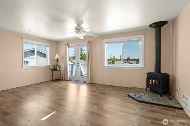 A view of the living area toward the NE. Free-standing stove will help keep the chill off in the winter months.