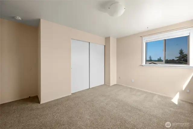 Another view of the primary bedroom.