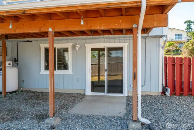 Exterior view of sliding glass doors from lower level.