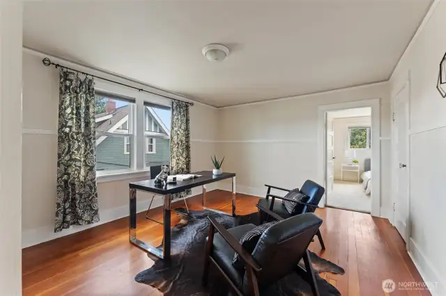 Walk through the first room on the second floor - a great bonus room for an at-home office!