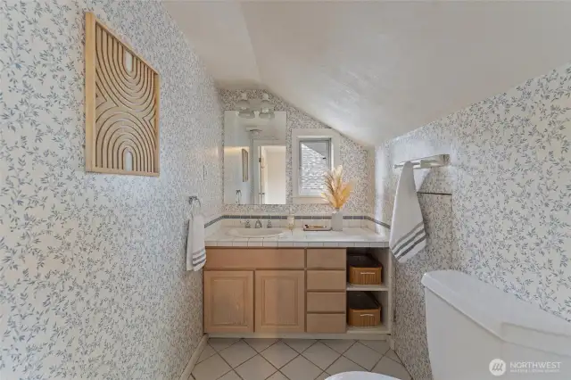The half bath on the second floor is charming and convenient