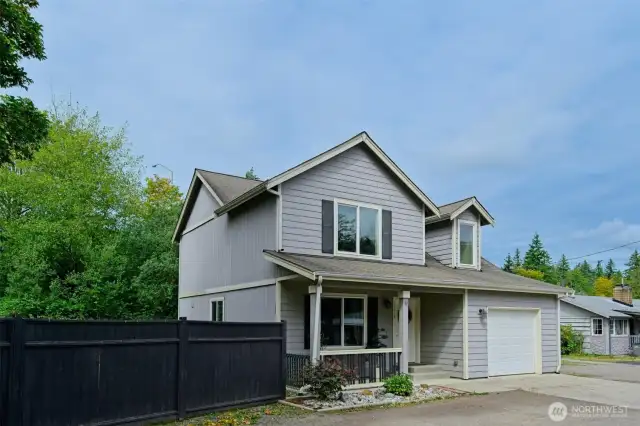This beautiful two-story home sits on .15 acres with a private and fully fenced yard.