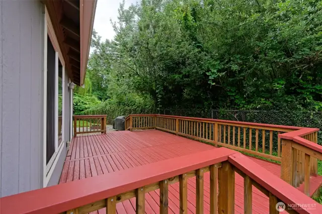 How about entertaining and/or relaxing here on this large and freshly painted back deck?!