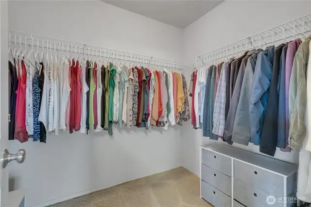 Primary bedroom walk in closet.