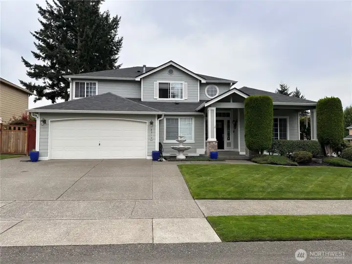 Home features an extended 3 car extended driveway with sidewalk to side gate that goes to the backyard patio.  The house has a tandem 3 car garage with access door to the backyard.