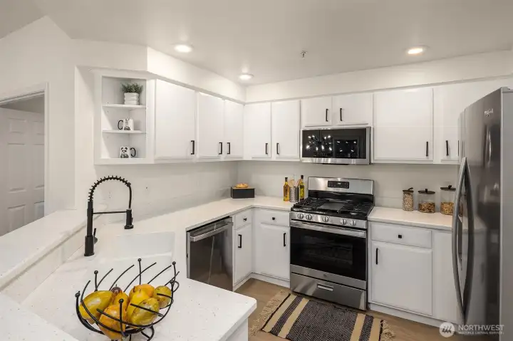 Brand new stove and dishwasher and newer French door fridge.