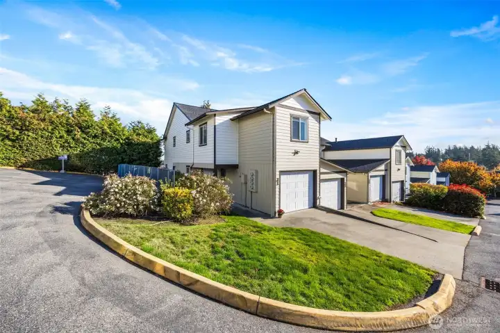 A beautifully maintained end-unit townhome in Oak Harbor offering timeless curb appeal and modern updates.