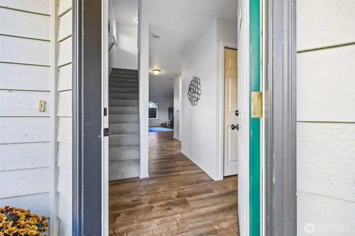 An inviting entry says “welcome home” before you even step inside. Fresh paint, clean lines, and coastal charm set the tone for effortless living on Whidbey Island.