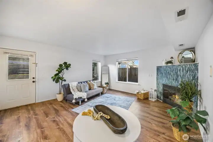 Thoughtfully updated and freshly painted, this light-filled space balances comfort with style. Custom blinds, meticulously maintained sets the tone for effortless living.