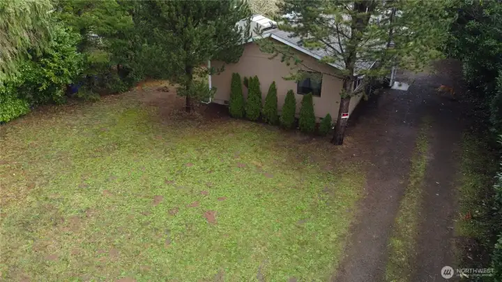 Plenty of room to install a privacy fence and put in a small garden.