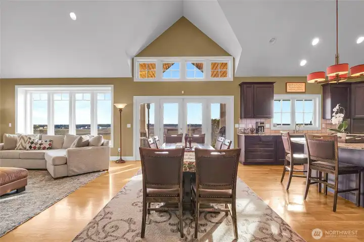 Sunlight pours into the great room, creating a warm, inviting space for connection and celebration.