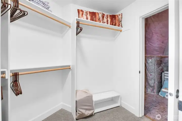 The oversized walk-in closet for the upstairs fourth bedroom also has a "secret" door into the large, insulated storage room where the furnace is and is located over the kitchen.