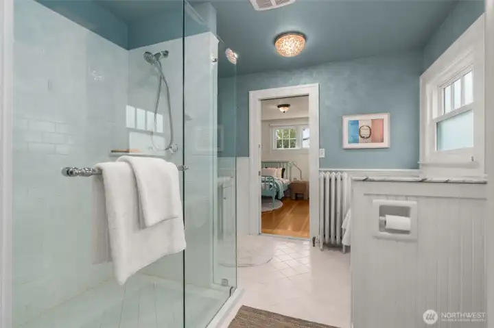 Glass shower blending old world with new