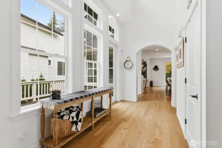 Plentiful windows look out to peaceful views of nature and let in incredible year-round light.