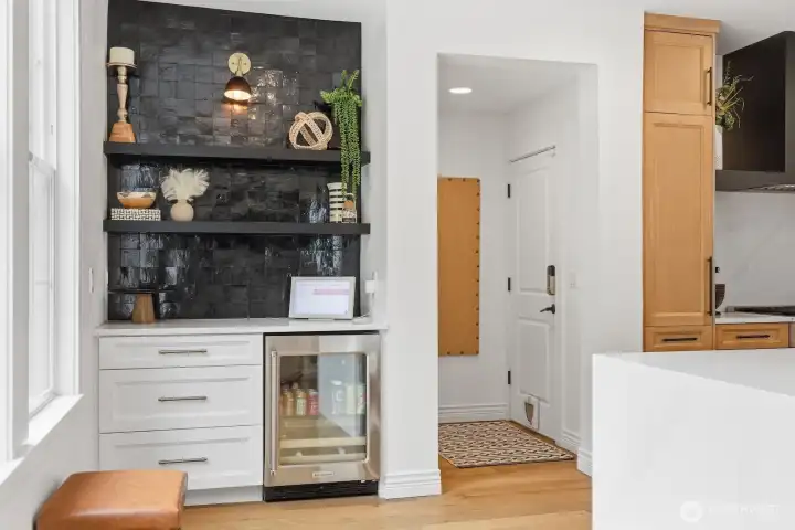 Another wine fridge, extra storage, and built-in shelves to display your favorite pieces - every inch was carefully thought out.