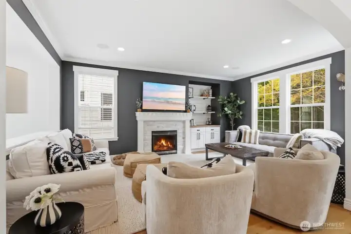 Relax with the crackle of the fire in the fireplace while looking out to gorgeous views of nature and smile - this is the good life.