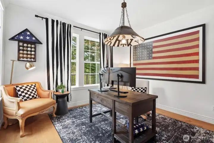 A dedicated office on the main level is great for remote work or learning, or use it as a guest space!