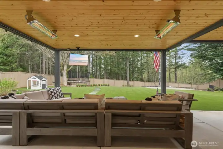 Relax here any time of year no matter the weather, and look out to a peaceful greenbelt with songbirds overhead.