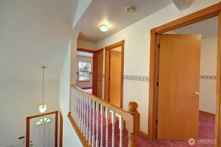Hallway to upstairs bedrooms