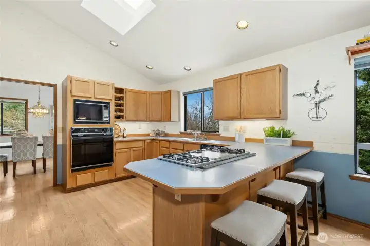 Vaulted ceilings and skylights make the kitchen area bright in all seasons.