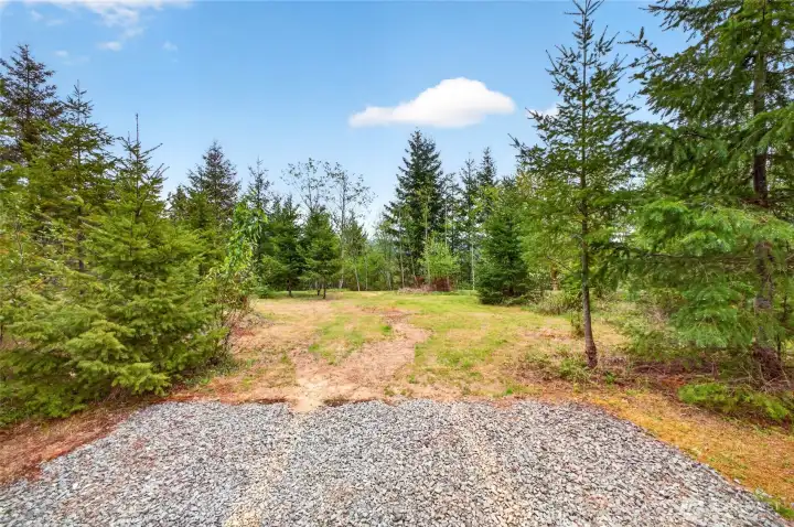 An optimal spot is cleared to create your vision of a home or weekend cabin.