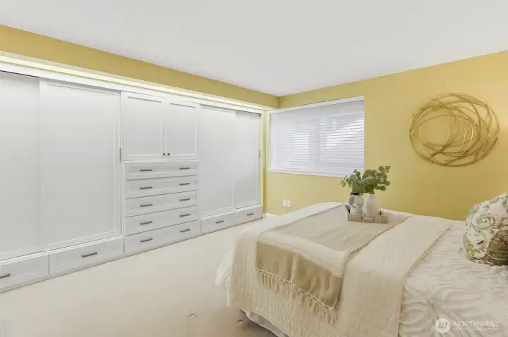 Primary bedroom featuring new carpet (2024) and updated cabinet door and drawer faces (2023). Primary bedroom featuring new carpet (2024) and updated cabinet door and drawer faces (2023).
