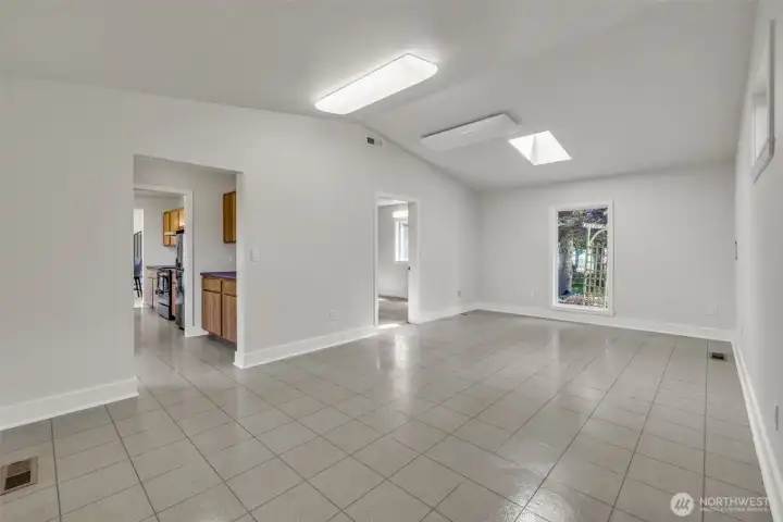 LIVING ROOM/GREAT ROOM - DOOR LEADING TO PRIMARY BEDROOM LIVING ROOM/GREAT ROOM - DOOR LEADING TO PRIMARY BEDROOM