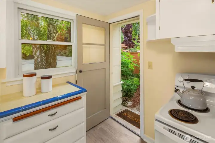 Cottage-inspired kitchen overlooking the courtyard garden.