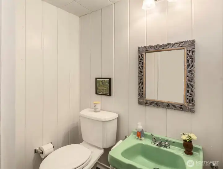 Lower-level bath supporting guest quarters, flexible living or future suite potential.